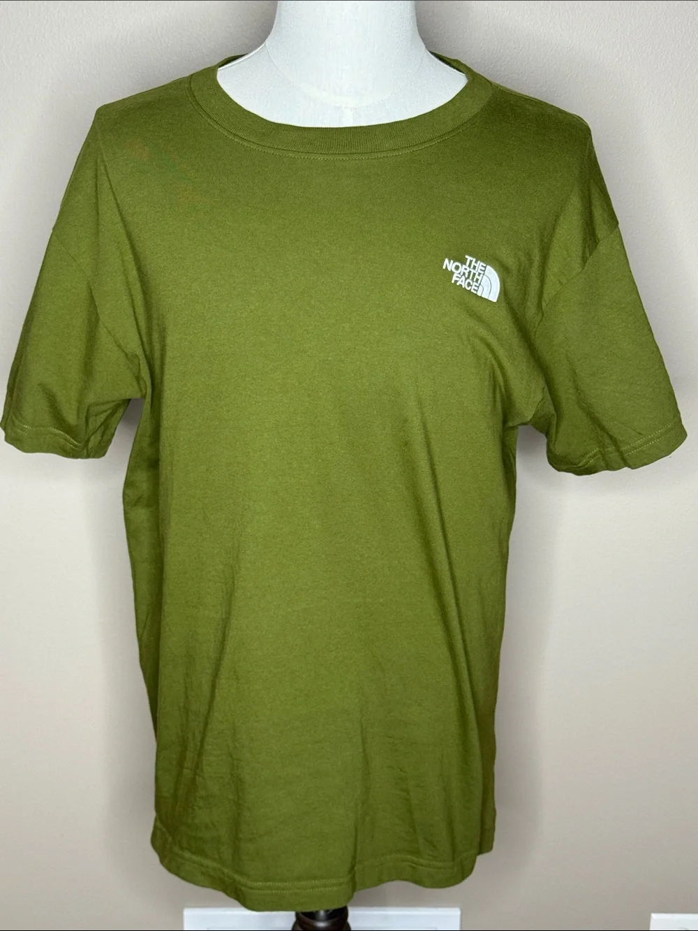 The North Face mens short sleeve olive green t-shirt size M.